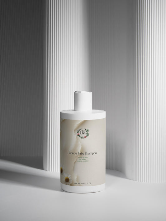 Bottle of gentle baby shampoo on a neutral background