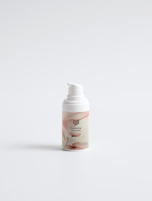 Skincare bottle with floral design on a white background