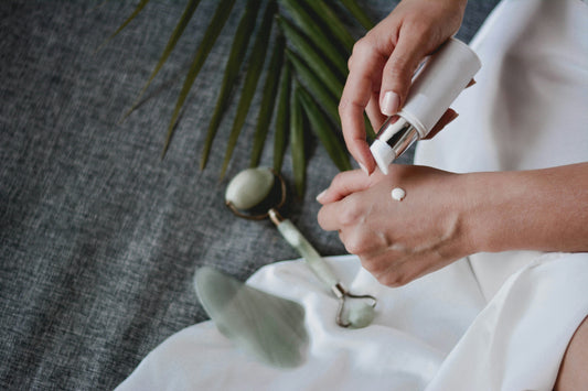 Serum being used on the palm of hand.