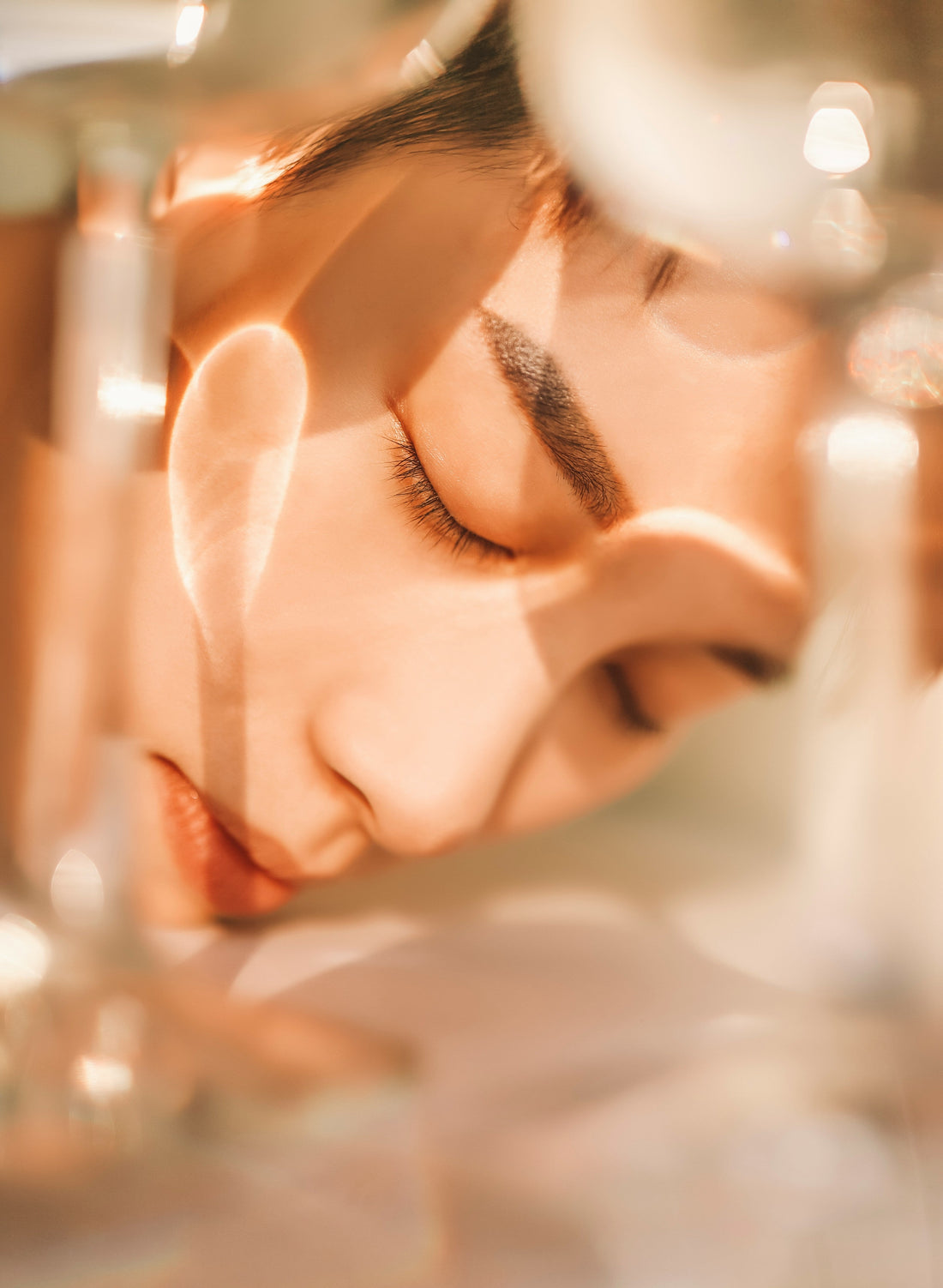 A woman in an glowing abstract setting.
