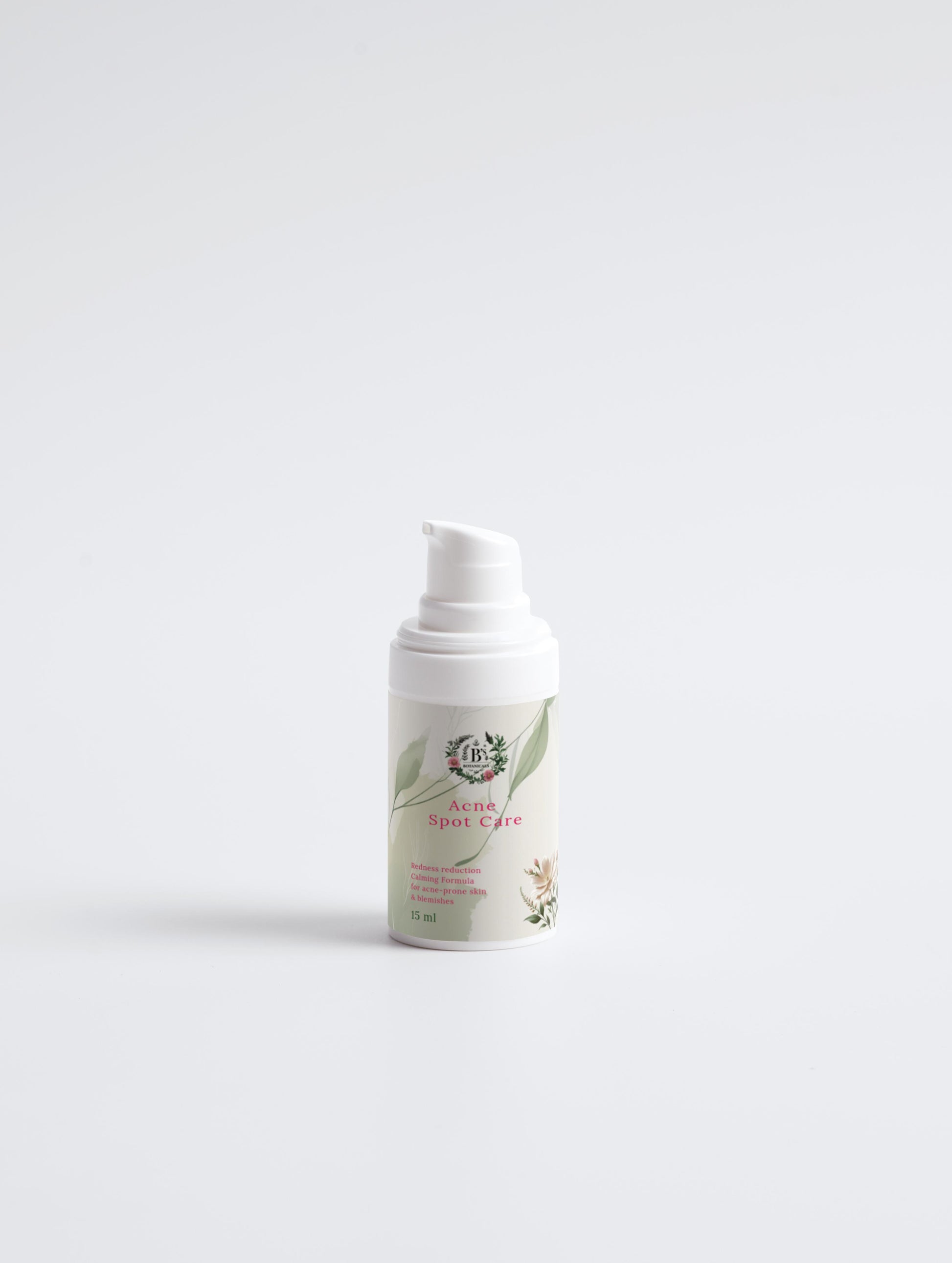 Skincare bottle with a white cap on a light gray background