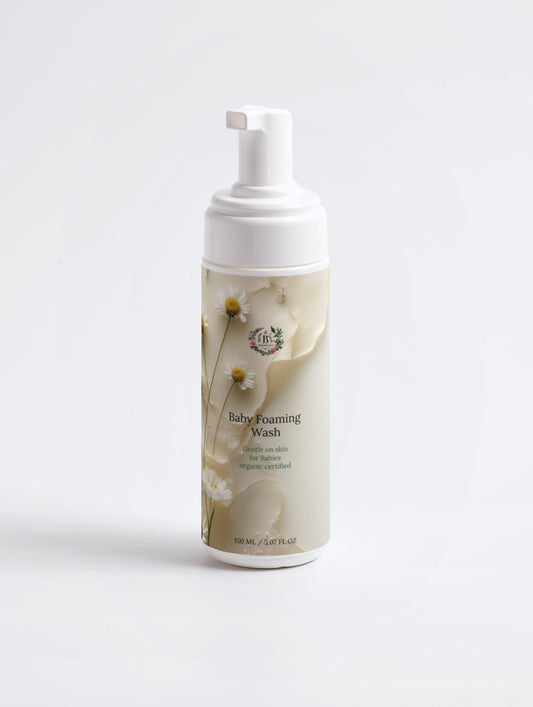 Foam pump bottle of baby foaming wash on a light gray background
