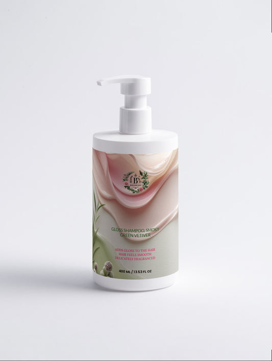 Close-up of Gloss Shampoo lather with creamy texture highlighting gentle botanical cleansing ingredients for soft and frizz-free hair