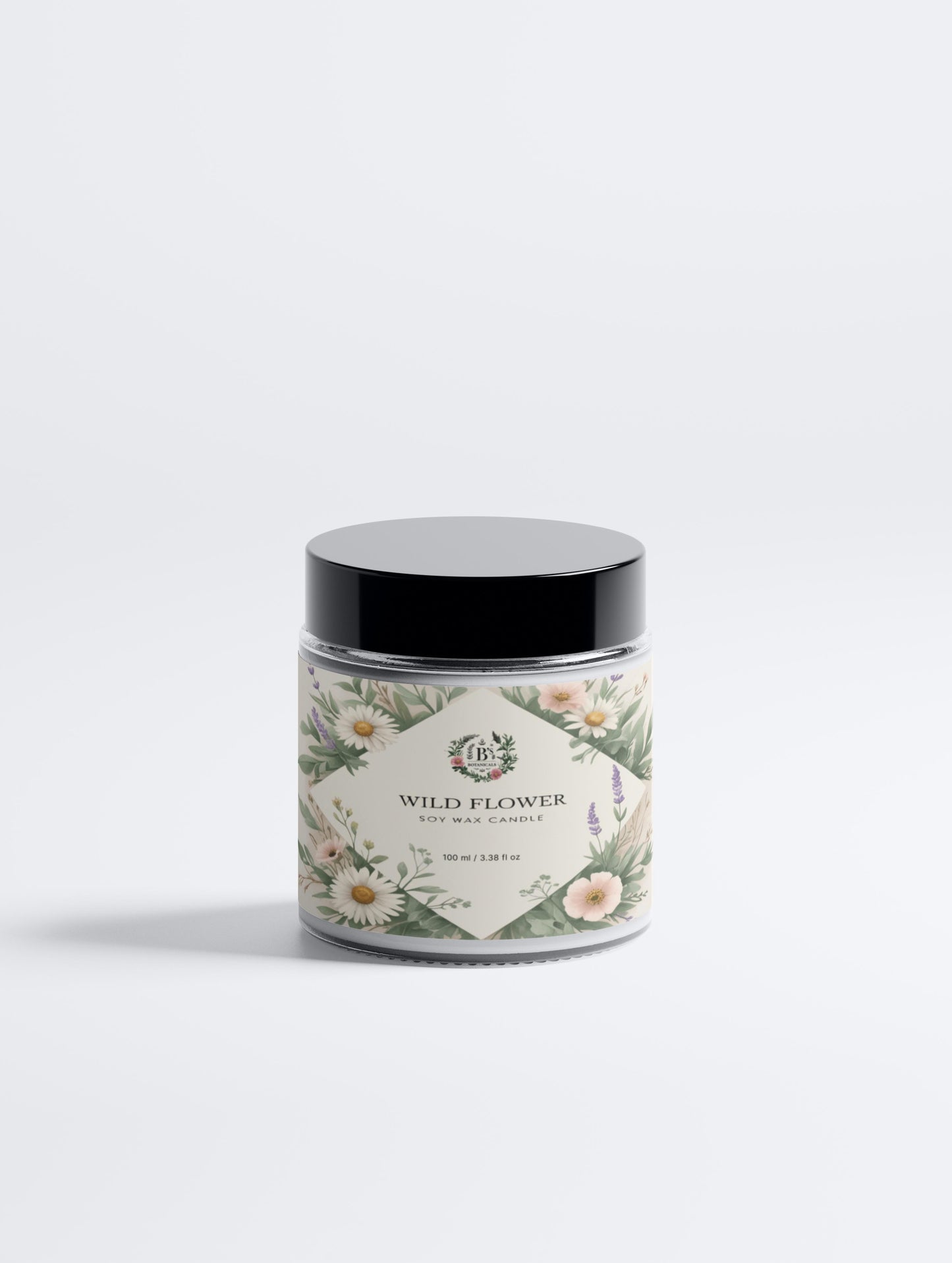 Candle jar with floral label on a white background